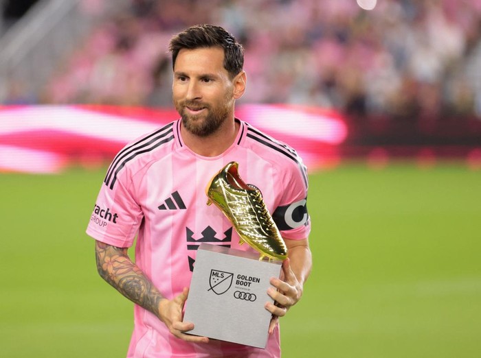Oct 24, 2025; Fort Lauderdale, Florida, USA; Inter Miami CF forward Lionel Messi (10) is presented with the MLS Golden Boot for the most goals scored during the regular season before the game against the Nashville SC at Chase Stadium. Mandatory Credit: Sam Navarro-Imagn Images