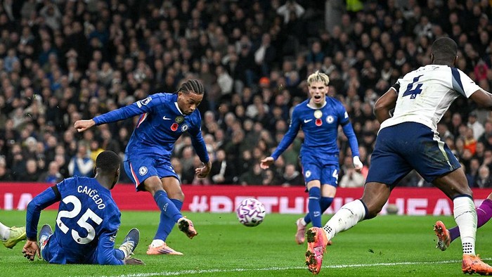 LONDON, ENGLAND - NOVEMBER 1: Joao Pedro of Chelsea shoots and scores during the Premier League match between Tottenham Hotspur and Chelsea at Tottenham Hotspur Stadium on November 1, 2025 in London, England. (Photo by Vince Mignott/MB Media/Getty Images)