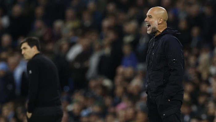 Soccer Football - Premier League - Manchester City v AFC Bournemouth - Etihad Stadium, Manchester, Britain - November 2, 2025 Manchester City manager Pep Guardiola reacts Action Images via Reuters/Jason Cairnduff EDITORIAL USE ONLY. NO USE WITH UNAUTHORIZED AUDIO, VIDEO, DATA, FIXTURE LISTS, CLUB/LEAGUE LOGOS OR LIVE SERVICES. ONLINE IN-MATCH USE LIMITED TO 120 IMAGES, NO VIDEO EMULATION. NO USE IN BETTING, GAMES OR SINGLE CLUB/LEAGUE/PLAYER PUBLICATIONS. PLEASE CONTACT YOUR ACCOUNT REPRESENTATIVE FOR FURTHER DETAILS..