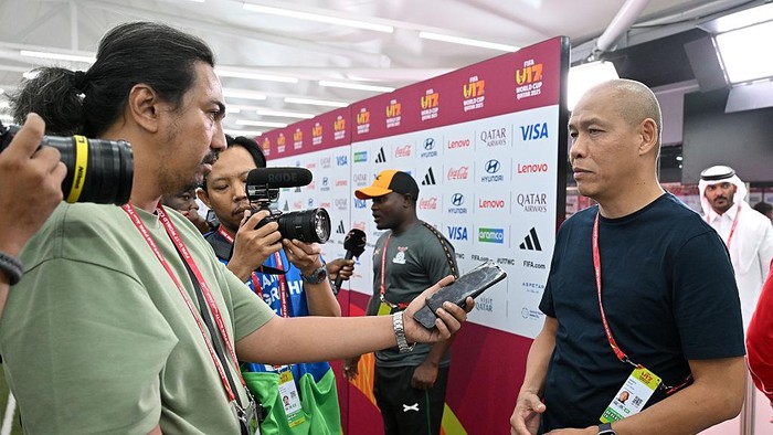DOHA, QATAR - NOVEMBER 04: Nova Arianto, Head Coach of Indonesia, speaks to the media following the FIFA Under-17 World Cup match between Indonesia and Zambia at Aspire Academy on November 04, 2025 in Doha, Qatar. (Photo by Chris Ricco - FIFA/FIFA via Getty Images)