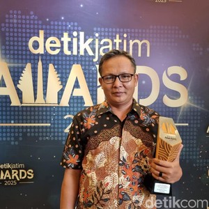 H. Khairul Umam (Haji Her)