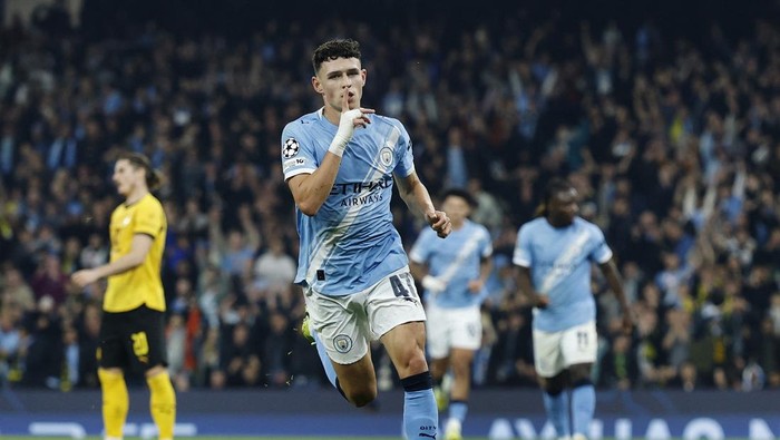 Soccer Football - UEFA Champions League - Manchester City v Borussia Dortmund - Etihad Stadium, Manchester, Britain - November 5, 2025 Manchester Citys Phil Foden celebrates scoring their first goal Action Images via Reuters/Jason Cairnduff
