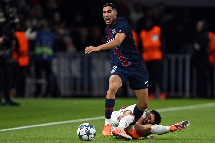 04 November 2025, France, Paris: Soccer: Champions League, Paris Saint-Germain - Bayern Munich, preliminary round, matchday 4, Parc des Princes, Luis Díaz (below, Bayern Munich) fouls Achraf Hakimi and is subsequently shown the red card. Photo: Federico Gambarini/dpa (Photo by Federico Gambarini/picture alliance via Getty Images)