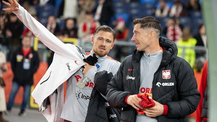 Matty Cash, Robert Lewandowski during Poland vs New Zealand - friendly match in Chorzow, Poland on October 9, 2025 (Photo by Foto Olimpik/NurPhoto via Getty Images)