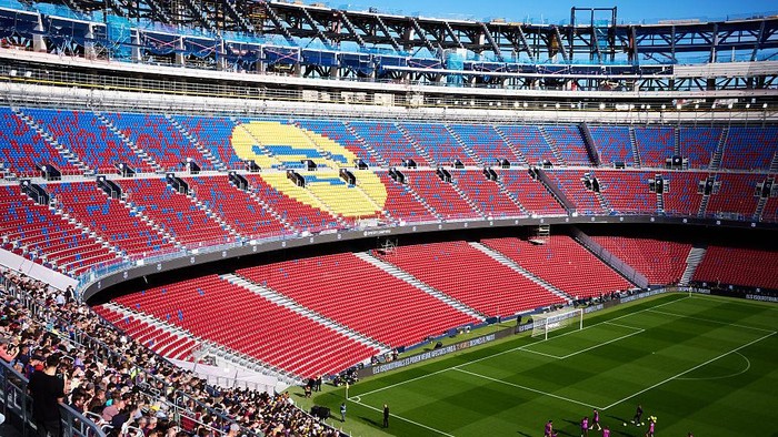 BARCELONA, SPAIN - NOVEMBER 07: General view of the stadium with FC Barcelona players during an open training session at Spotify Camp Nou on November 07, 2025 in Barcelona, Spain. (Photo by Manuel Queimadelos/Quality Sport Images/Getty Images)