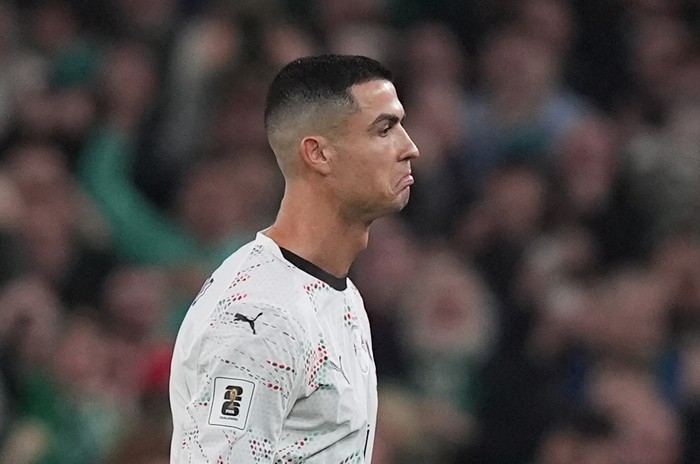 Portugal's Cristiano Ronaldo hands the arm band to team-mate Bernardo Silva after being shown a red card during the 2026 FIFA World Cup European Qualifying, Group F match at the Aviva Stadium in Dublin, Ireland. Picture date: Thursday November 13, 2025. (Photo by Niall Carson/PA Images via Getty Images)
