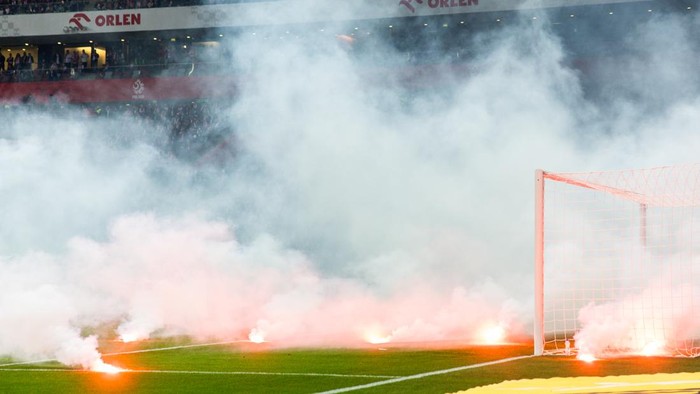 Polish fans interrupted the match by throwing flares onto the pitch during World Cup 2026 European qualifiers: Poland vs Netherlands match in Warsaw, Poland on November 14, 2025 (Photo by Foto Olimpik/NurPhoto via Getty Images)