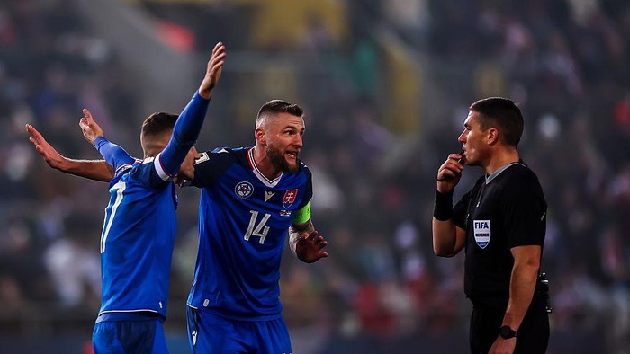 BRATISLAVA, SLOVAKIA - NOVEMBER 14: Milan kriniar of Slovakia in complains to the referee during the FIFA World Cup 2026 qualifier match between Slovakia and Northern Ireland at Kosicka futbalova arena on November 14, 2025 in Koice, Slovakia. (Photo by David Balogh/Getty Images)