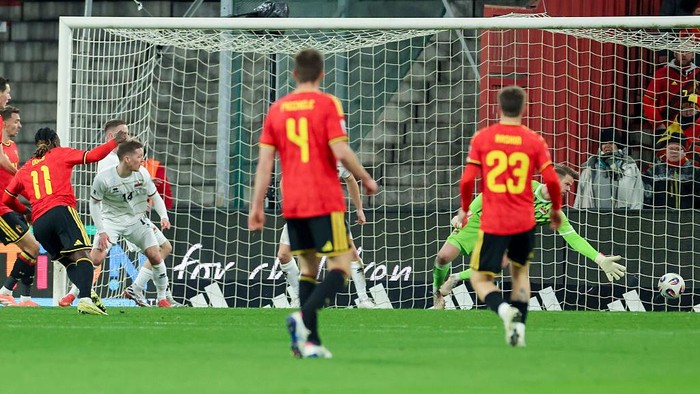 Liege, Belgium - November 18: Jeremy Doku of Belgium scores past goalkeeper Benjamin Buechel of Liechtenstein to make it 2-0 during the FIFA World Cup 2026 qualifier match between Belgium and Liechtenstein at Stade Maurice Dufrasne on November 18, 2025 in Liege, Belgium. (Photo by Marco Steinbrenner/DeFodi Images/DeFodi via Getty Images)