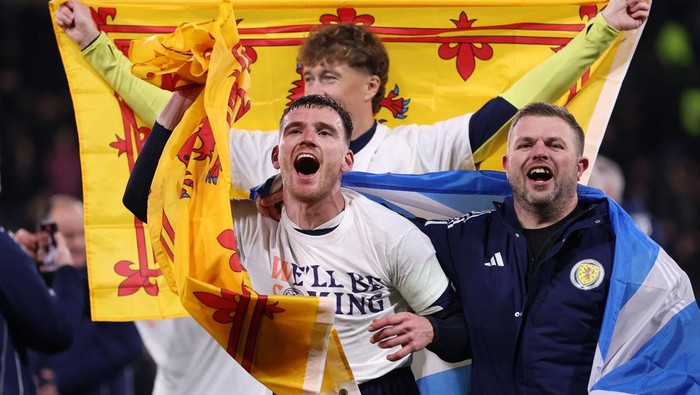 Soccer Football - FIFA World Cup - UEFA Qualifiers - Group C - Scotland v Denmark - Hampden Park, Glasgow, Scotland, Britain - November 18, 2025 Scotlands Andrew Robertson celebrates after they qualify for the World Cup Action Images via Reuters/Lee Smith