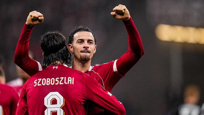 FRANKFURT AM MAIN, GERMANY - OCTOBER 22 Dominik Szoboszlai of Liverpool celebrates with Curtis Jones of Liverpool after scoring his teams first goal during the UEFA Champions League 2025/26 League Phase MD3 match between Eintracht Frankfurt and Liverpool FC at Frankfurt Stadion on October 22, 2025 in Frankfurt am Main, Germany. (Photo by Rene Nijhuis/MB Media/Getty Images)