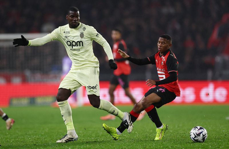 Paul Pogba Soccer Football - Ligue 1 - Stade Rennes v AS Monaco - Roazhon Park, Rennes, France - November 22, 2025 AS Monaco's Paul Pogba in action with Stade Rennes' Lucas Rosier REUTERS/Stephane Mahe