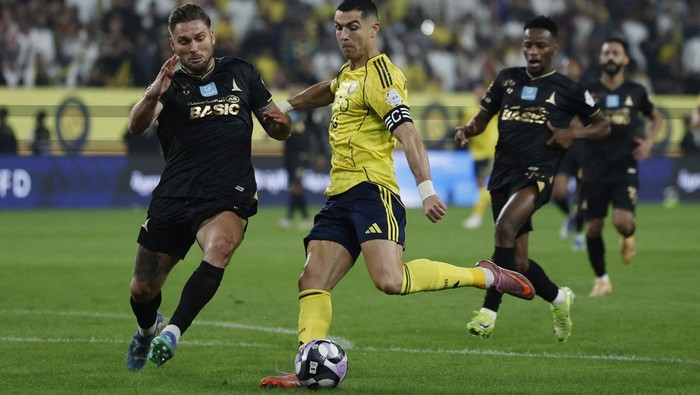 Soccer Football - Saudi Pro League - Al Nassr v Al Khaleej - Al Awwal Park, Riyadh, Saudi Arabia - November 23, 2025 Al Nassr's Cristiano Ronaldo scores their fourth goal REUTERS/Hamad I Mohammed TPX IMAGES OF THE DAY