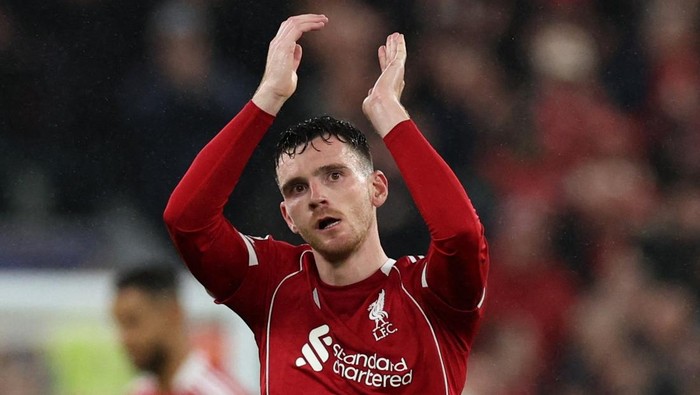 Soccer Football - UEFA Champions League - Liverpool v Real Madrid - Anfield, Liverpool, Britain - November 4, 2025  Liverpools Andy Robertson applauds fans as he is substituted off REUTERS/Phil Noble