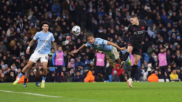 MANCHESTER, ENGLAND - NOVEMBER 25: Patrik Schick of Bayer Leverkusen scores his teams second goal during the UEFA Champions League 2025/26 League Phase MD5 match between Manchester City and Bayer 04 Leverkusen at City of Manchester Stadium on November 25, 2025 in Manchester, England. (Photo by Carl Recine/Getty Images)