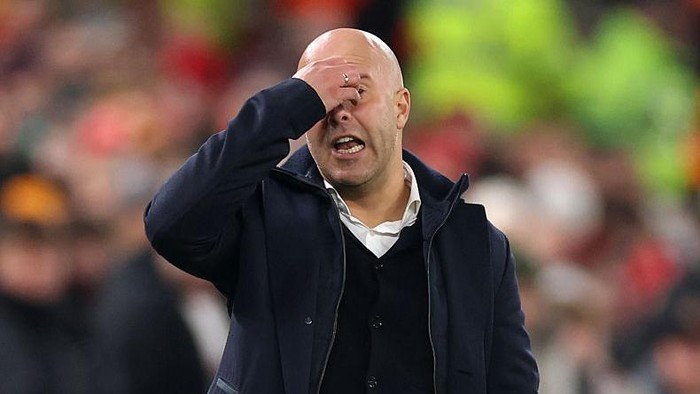 LIVERPOOL, ENGLAND - NOVEMBER 26: Arne Slot, Manager of Liverpool, reacts during the UEFA Champions League 2025/26 League Phase MD5 match between Liverpool FC and PSV Eindhoven at Anfield on November 26, 2025 in Liverpool, England. (Photo by Carl Recine/Getty Images)