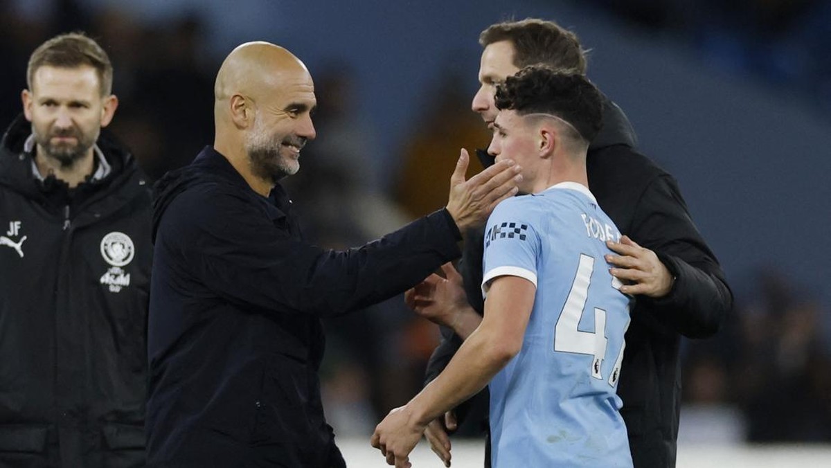 Pep Guardiola lega Manchester City menang atas Leeds United berkat gol di injury time (Foto: Action Images via Reuters/Jason Cairnduff)