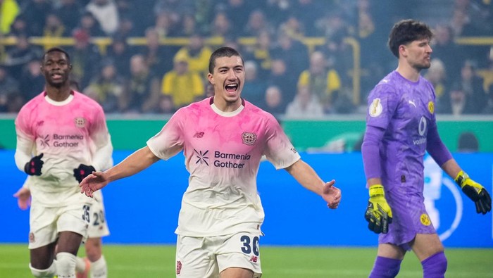 DORTMUND, GERMANY - DECEMBER 2: Ibrahim Maza of Bayer 04 Leverkusen celebrates after scoring his teams first goal during the DFB Cup round of 16 match between Borussia Dortmund and Bayer 04 Leverkusen at Signal Iduna Park on December 2, 2025 in Dortmund, Germany. (Photo by Rene Nijhuis/MB Media/Getty Images)