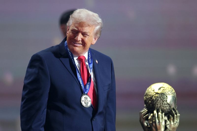 WASHINGTON, DC - DECEMBER 05: U.S. President Donald Trump receives the FIFA Peace Prize during the FIFA World Cup 2026 Official Draw at John F. Kennedy Center for the Performing Arts on December 05, 2025 in Washington, DC.   Dan Mullan/Getty Images/AFP (Photo by Dan Mullan / GETTY IMAGES NORTH AMERICA / Getty Images via AFP)