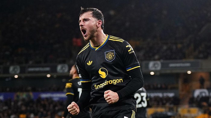 Manchester Uniteds Mason Mount celebrates scoring their sides third goal of the game during the Premier League match at Molineux Stadium, Wolverhampton. Picture date: Monday December 8, 2025. (Photo by Jacob King/PA Images via Getty Images)
