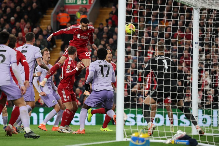 Soccer Football - Premier League - Liverpool v Brighton & Hove Albion - Anfield, Liverpool, Britain - December 13, 2025 Liverpool's Hugo Ekitike scores their second goal past Brighton & Hove Albion's Bart Verbruggen REUTERS/Phil Noble EDITORIAL USE ONLY. NO USE WITH UNAUTHORIZED AUDIO, VIDEO, DATA, FIXTURE LISTS, CLUB/LEAGUE LOGOS OR 'LIVE' SERVICES. ONLINE IN-MATCH USE LIMITED TO 120 IMAGES, NO VIDEO EMULATION. NO USE IN BETTING, GAMES OR SINGLE CLUB/LEAGUE/PLAYER PUBLICATIONS. PLEASE CONTACT YOUR ACCOUNT REPRESENTATIVE FOR FURTHER DETAILS..