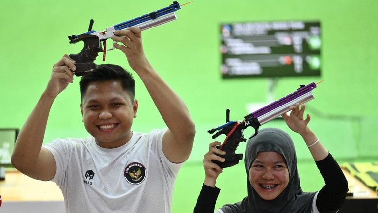 Pasangan Merah Putih memastikan kemenangan setelah mengalahkan tim Vietnam yang diperkuat Thu Vinh Trinh dan Quang Huy Pham dengan keunggulan skor 17–9 pada partai final. ANTARA FOTO/NOVA WAHYUDI