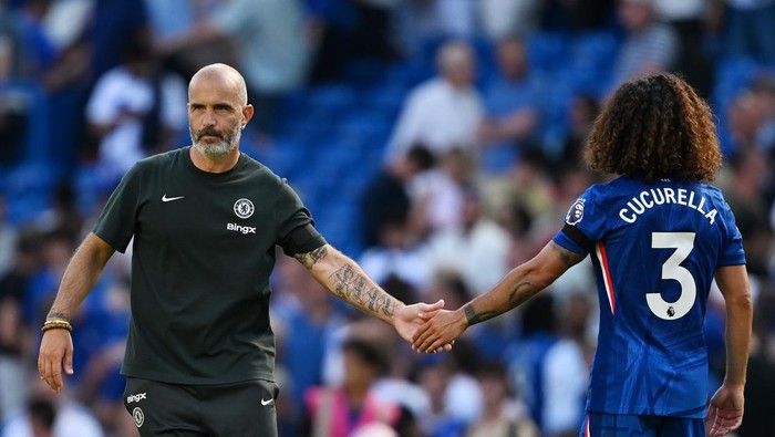 LONDON, ENGLAND - AUGUST 17: Enzo Maresca, Head Coach of Chelsea, interacts with Marc Cucurella of Chelsea following the Premier League match between Chelsea and Crystal Palace at Stamford Bridge on August 17, 2025 in London, England. (Photo by Darre