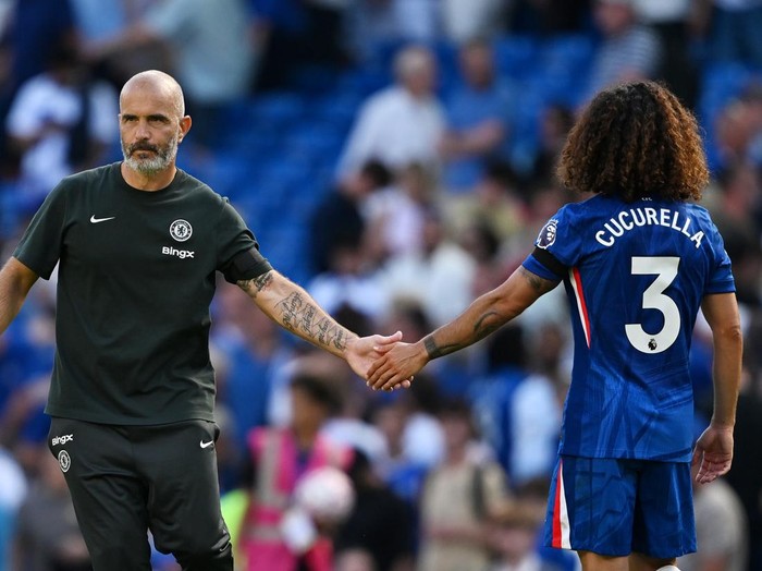 LONDON, ENGLAND - AUGUST 17: Enzo Maresca, Head Coach of Chelsea, interacts with Marc Cucurella of Chelsea following the Premier League match between Chelsea and Crystal Palace at Stamford Bridge on August 17, 2025 in London, England. (Photo by Darren Walsh/Chelsea FC via Getty Images)