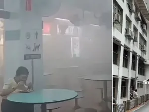 Viral! Wanita Ini Tetap Santuy Makan Kwetiau saat Terjadi Kebakaran