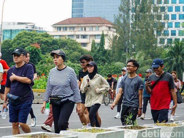 Meski Diguyur Hujan, CFD Sudirman Tetap Jadi Favorit Warga