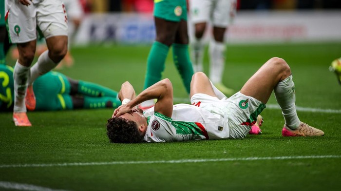Rabat, Morocco - January 18: Morocco's Neil El Aynaoui goes down with a head injury during the Africa Cup Of Nations Final match between Senegal and Morocco at Prince Moulay Abdellah Stadium on January 18, 2026 in Rabat, Morocco. (Photo by Torbjorn Tande/DeFodi Images/DeFodi via Getty Images)