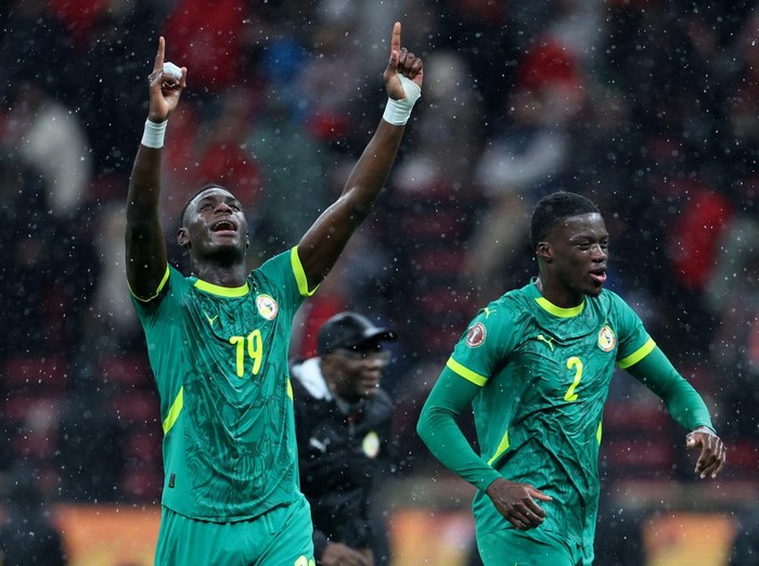 Soccer Football - CAF Africa Cup of Nations - Morocco 2025 - Final - Senegal v Morocco - Prince Moulay Abdellah Stadium, Rabat, Morocco - January 18, 2026 Senegal's Moussa Niakhate and Mamadou Sarr celebrate after the match REUTERS/Amr Abdallah Dalsh