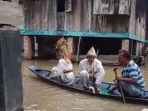 Viral Pengantin di PALI Tetap Gelar Resepsi Pernikahan di Tengah Banjir