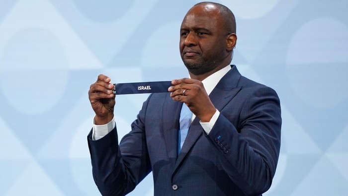 BRUSSELS, BELGIUM - FEBRUARY 12: Draw ambassador Patrick Vieira draws the card of Israel during the UEFA Nations League 2026/28 League Phase Draw at Brussels Expo on February 12, 2026 in Brussels, Belgium. (Photo by Alex Bierens de Haan - UEFA/UEFA v