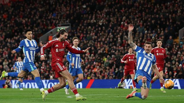 Soccer Football -  FA Cup - Fourth Round - Liverpool v Brighton & Hove Albion - Anfield, Liverpool, Britain - February 14, 2026 Liverpool's Dominik Szoboszlai scores their second goal REUTERS/Phil Noble