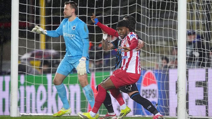 BRUGES, BELGIUM - FEBRUARY 18: Ademola Lookman of Atletico de Madrid celebrates scoring his teams second goal during the UEFA Champions League 2025/26 League Knockout Play-off First Leg match between Club Brugge KV and Atletico de Madrid at Jan Brey