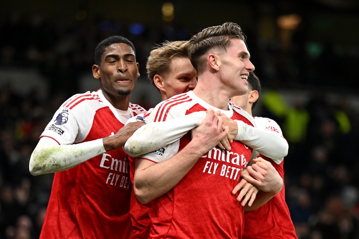 LONDON, ENGLAND - FEBRUARY 22: Viktor Gyoekeres of Arsenal celebrates with teammates Cristhian Mosquera and Martin Odegaard after scoring his team's fourth goal during the Premier League match between Tottenham Hotspur and Arsenal at Tottenham Hotspur Stadium on February 22, 2026 in London, England. (Photo by Mike Hewitt/Getty Images)
