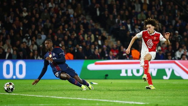 Soccer Football - UEFA Champions League - Play Off - Second Leg - Paris St Germain v AS Monaco - Parc des Princes, Paris, France - February 25, 2026 AS Monaco's Maghnes Akliouche scores their first goal REUTERS/Sarah Meyssonnier