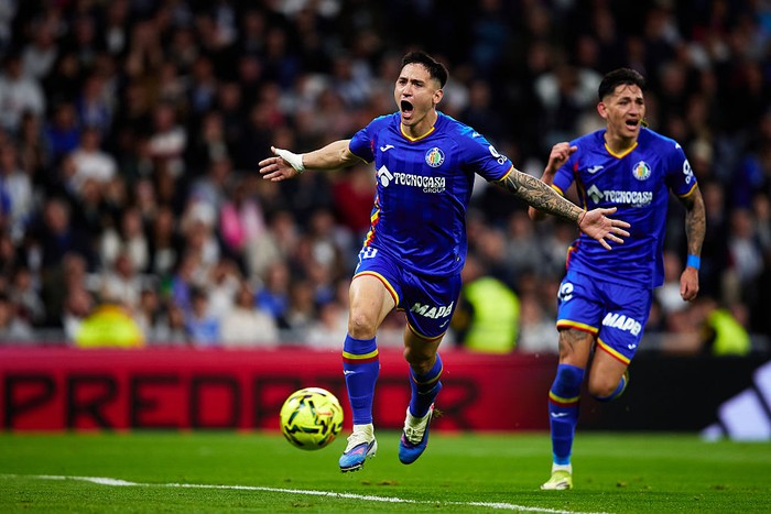 MADRID, SPAIN - MARCH 02: Martin Satriano of Getafe CF celebrates after scoring their sides first goal during the LaLiga EA Sports match between Real Madrid CF and Getafe CF at Estadio Santiago Bernabeu on March 02, 2026 in Madrid, Spain. (Photo by 