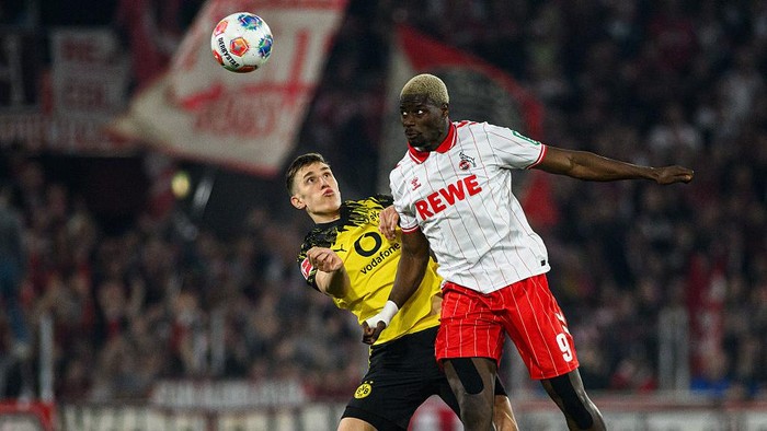 Borussia Dortmund menang 2-1 atas FC Koln dalam lanjutan Bundesliga.