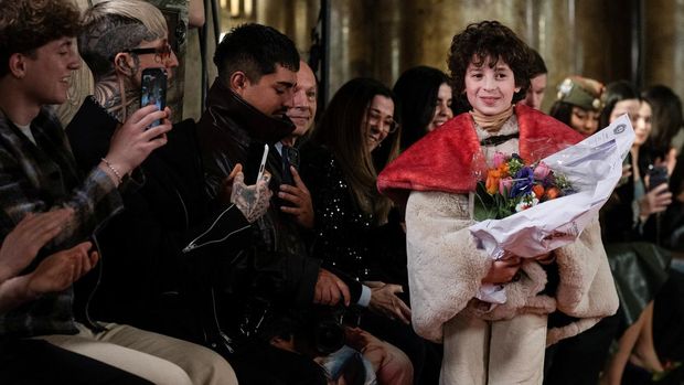 US fashion designer Max Alexander acknowledges the audience at the end of the Max Alexander  Women's Ready to Wear Fall/Winter 2026-2027 collection fashion show as part of the Paris Women Fashion Week, at the Palais Garnier, in Paris, on March 3, 2026. (Photo by Blanca CRUZ / AFP)