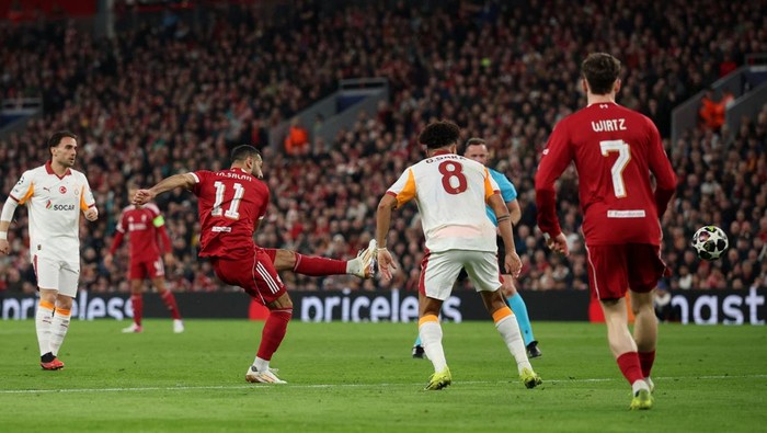 Soccer Football - UEFA Champions League - Round 16 - Second Leg - Liverpool v Galatasaray - Anfield, Liverpool, Britain - March 18, 2026 Liverpools Mohamed Salah scores their fourth goal REUTERS/Phil Noble