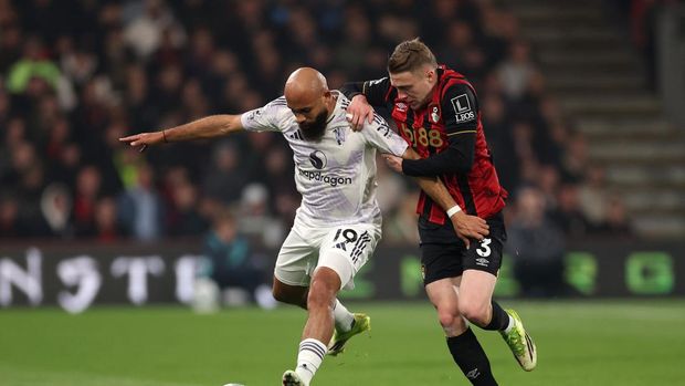 Bryan Mbeumo BOURNEMOUTH, ENGLAND - MARCH 20: Bryan Mbeumo of Manchester United is challenged by Adrien Truffert of AFC Bournemouth during the Premier League match between Bournemouth and Manchester United at Vitality Stadium on March 20, 2026 in Bournemouth, England. (Photo by Warren Little/Getty Images)
