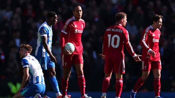 BRIGHTON, ENGLAND - MARCH 21: Virgil van Dijk of Liverpool reacts after the referee gives a foul 
 during the Premier League match between Brighton & Hove Albion and Liverpool at Amex Stadium on March 21, 2026 in Brighton, United Kingdom. (Photo by 