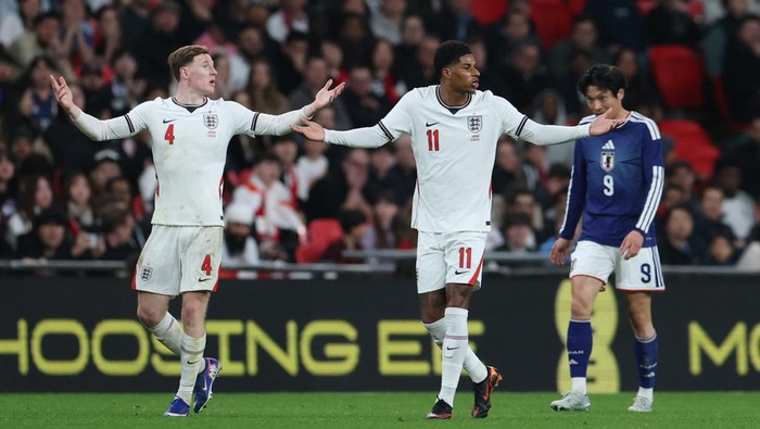 Soccer Football - International Friendly - England v Japan - Wembley Stadium, London, Britain- March 31, 2026  Englands Elliot Anderson and Marcus Rashford react REUTERS/Isabel Infantes