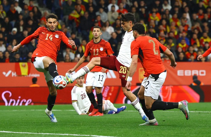 Soccer Football - International Friendly - Spain v Egypt - RCDE Stadium, Cornella de Llobregat, Spain - March 31, 2026 Spains Pedri in action with Egypts Hamdy Fathy REUTERS/Albert Gea