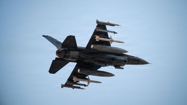 This US Air Force handout photo released on March 5, 2026, by US Central Command Public Affairs shows a US Air Force F-15E taking flight at un undisclosed location in the Middle East in support of 