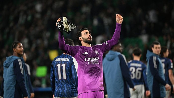 LISBON, PORTUGAL - APRIL 07: David Raya of Arsenal celebrates a goal during the UEFA Champions League 2025/26 Quarter-Final First Leg match between Sporting Clube de Portugal and Arsenal FC at Estadio Jose Alvalade on April 07, 2026 in Lisbon, Portug