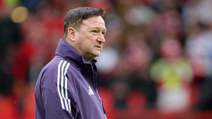 Asisten Manajer Man United Steve Holland masih mengincar gelar juara Liga Inggris.
