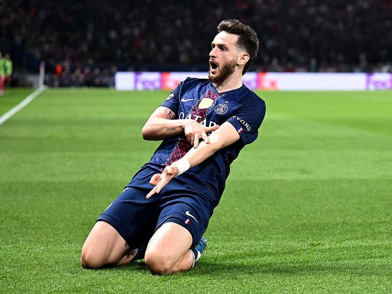 PARIS, FRANCE - APRIL 08: Khvicha Kvaratskhelia of Paris Saint-Germain celebrates scoring his team's second goal during the UEFA Champions League 2025/26 Quarter-Final First Leg match between Paris Saint-Germain FC and Liverpool FC at Parc des Princes on April 08, 2026 in Paris, France. (Photo by Stuart Franklin - UEFA/UEFA via Getty Images)